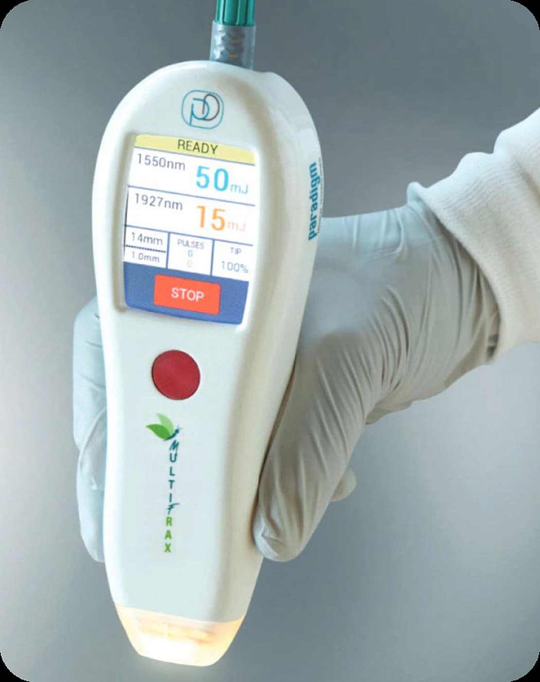 MultiFRAX handpiece in a gloved hand