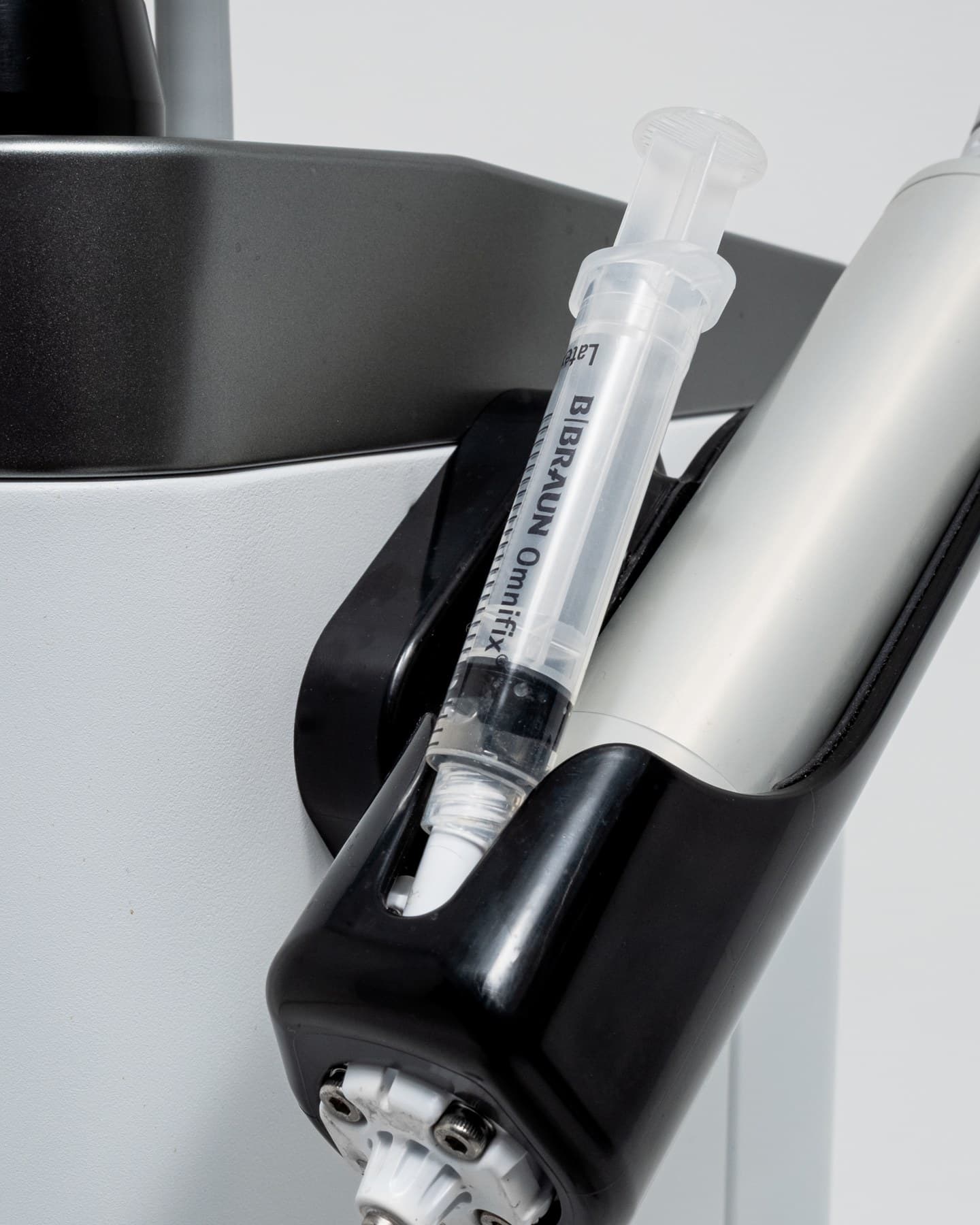 NovoJet handpiece with a Luer-lock syringe attached